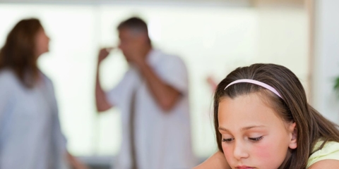 Upset child, parents fighting