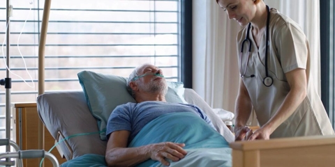 Man in hospital bed