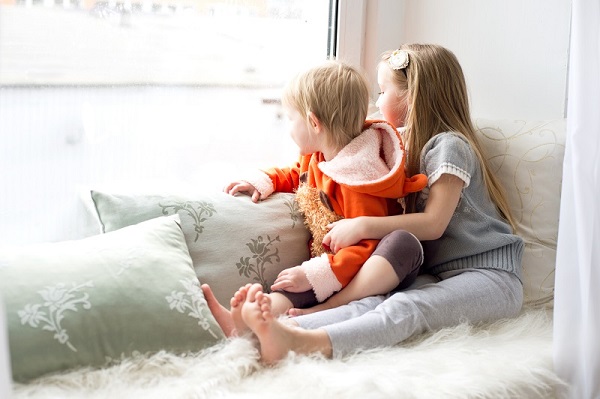 children looking out window